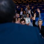 Business executives participating in a business meeting at conference center